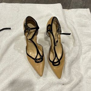 Tan and black pumps